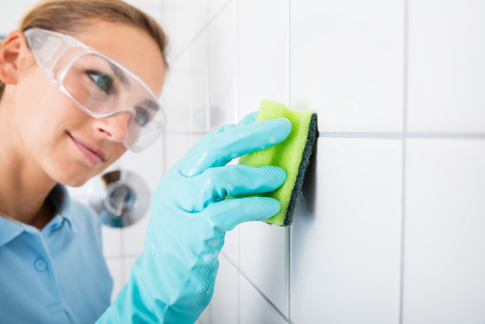 Woman-Cleaning-The-White-Tile